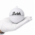 Swish 80mm portable golf ball cleaner in hand - White